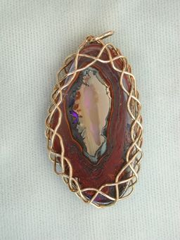 one side of opal pendant