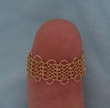 Knotted chain ring, 12 3-loop prolong knots.