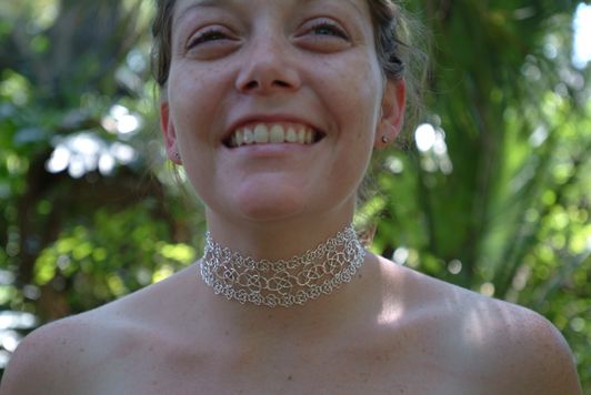 Two sizes of knotted chain mail in a choker.