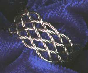 Open weave 7 by 11 ring.